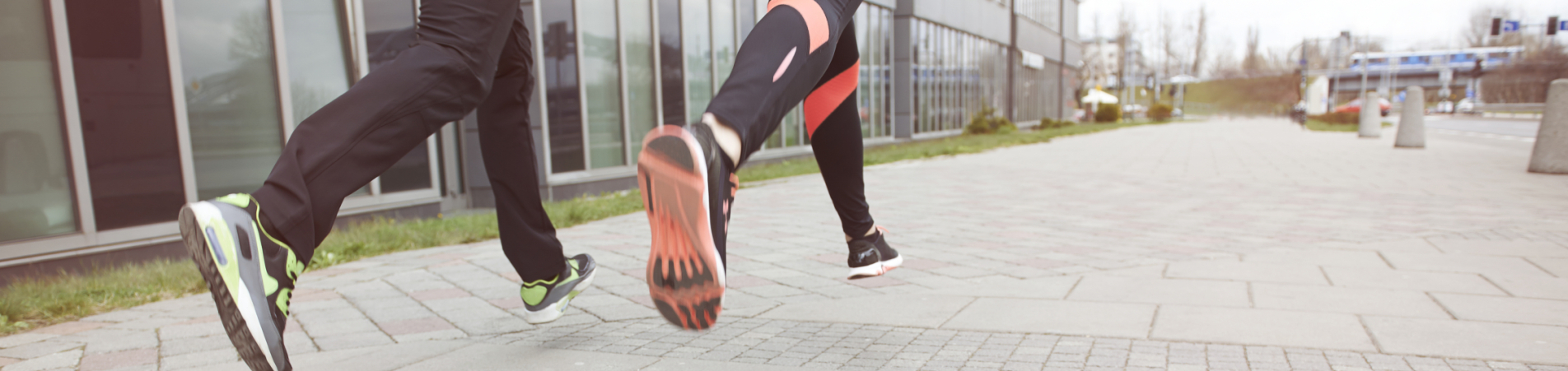 close-up-two-runners-city