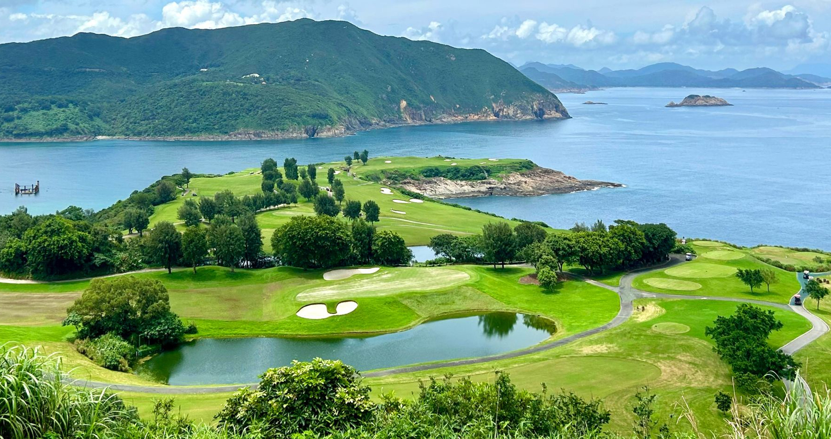 本頁圖片/檔案 - golfer-swinging-club-sunny-day-green-golf-course-surrounded-by-trees-blue-skies